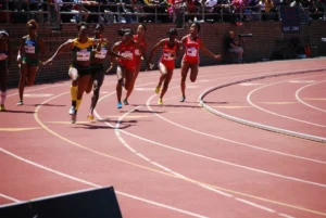 women running in a sports oval